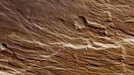 Die aufgebrochene Marsoberfläche bei Claritas Fossae