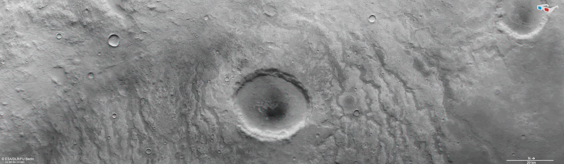 Anaglyphenbild eines Kraters in der Region Aonia Terra