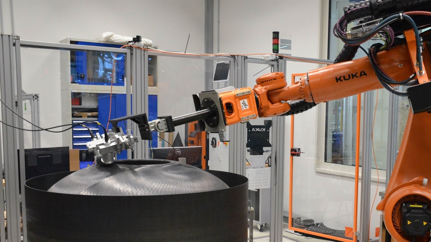 Air-coupled ultrasound on a rocket motor demonstrator dome with a KUKA industrial robot