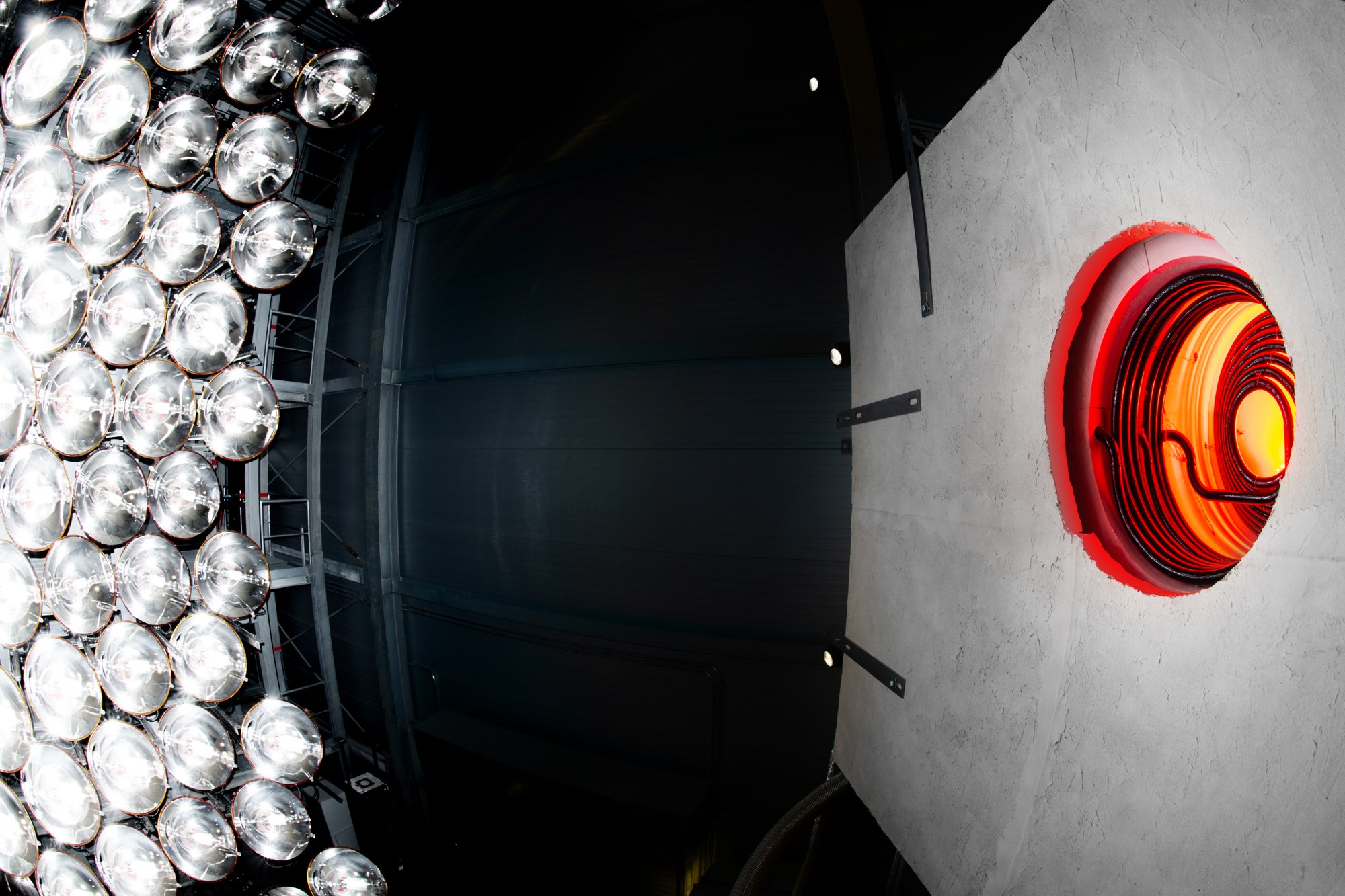 The SOL reactor, glowing red after irradiation in the Synlight.