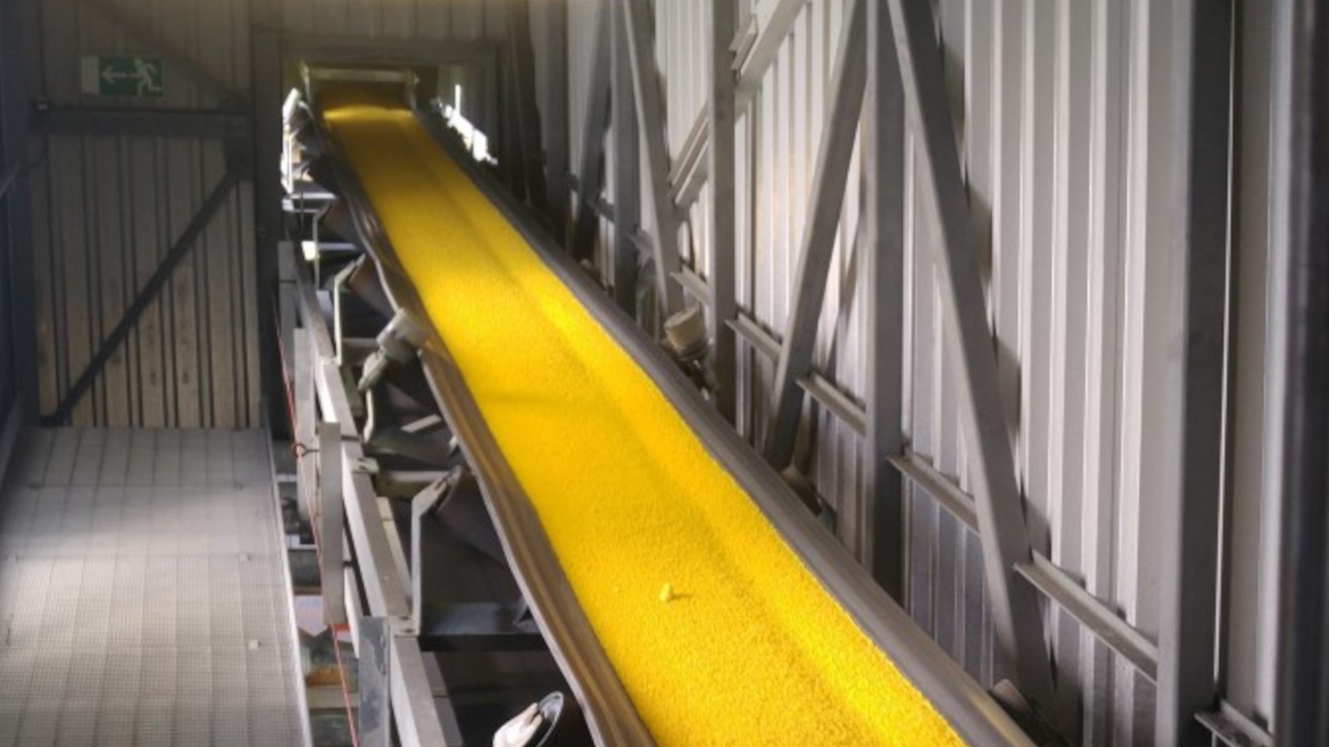 Sulphur is transported on a conveyor belt