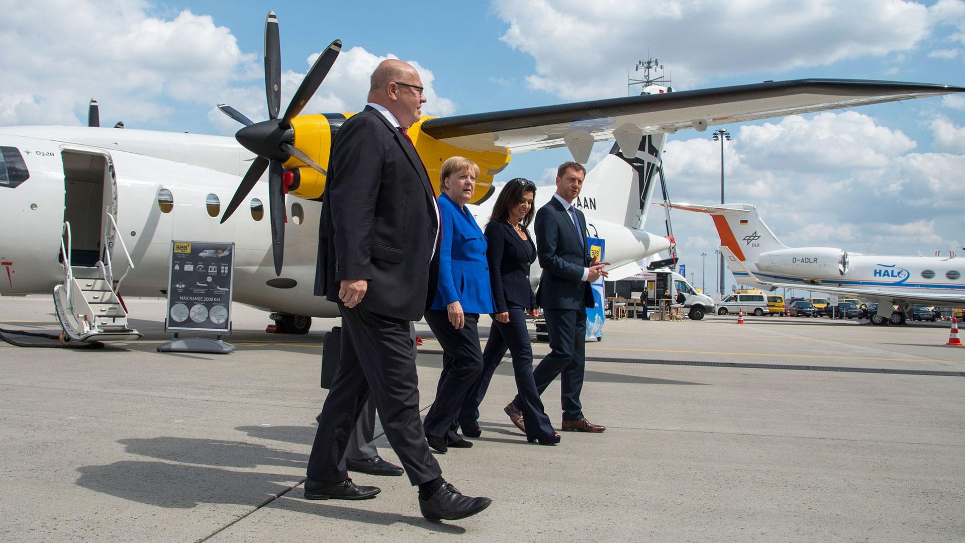 German Federal Chancellor Merkel and Economic Affairs and Energy Minister Altmaier visit the first National Aeronautics Conference