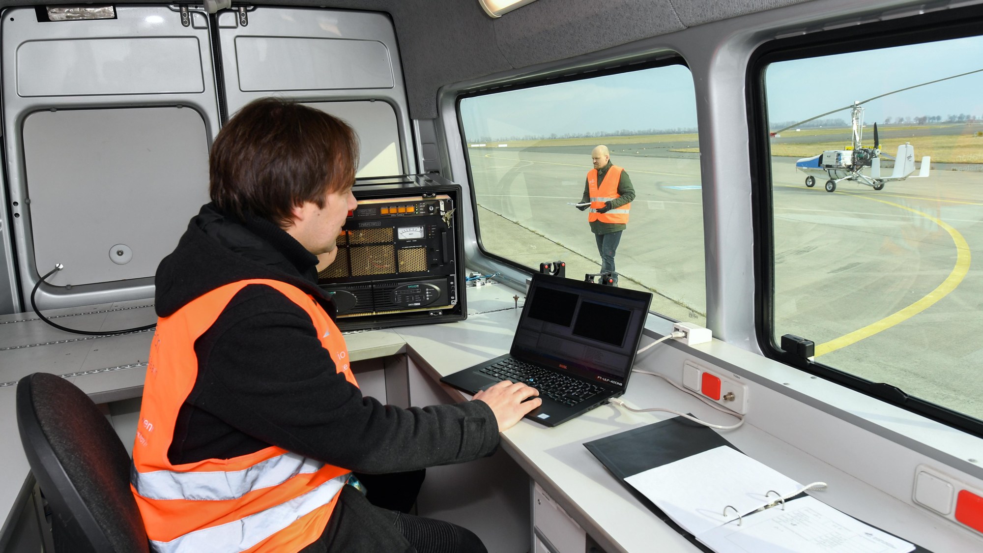 Uncrewed gyrocopter test flights are monitored from a mobile control centre on the ground.