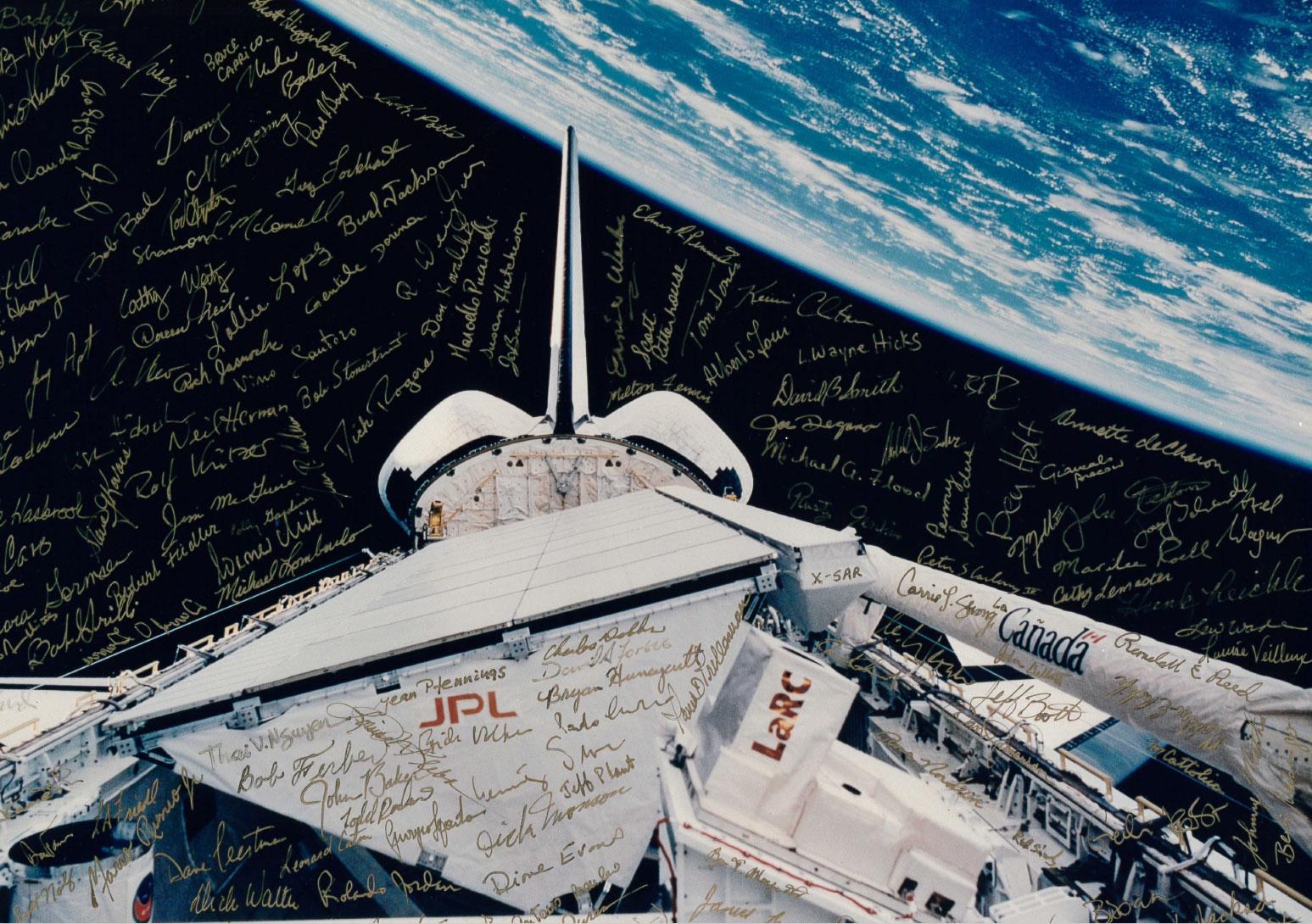 Payload bay of Space Shuttle Endeavour with the signatures of many members of the team