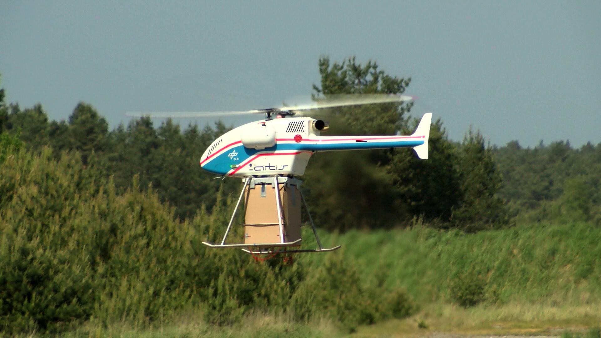 Uncrewed DLR superARTIS research helicopter with drop system for relief supplies