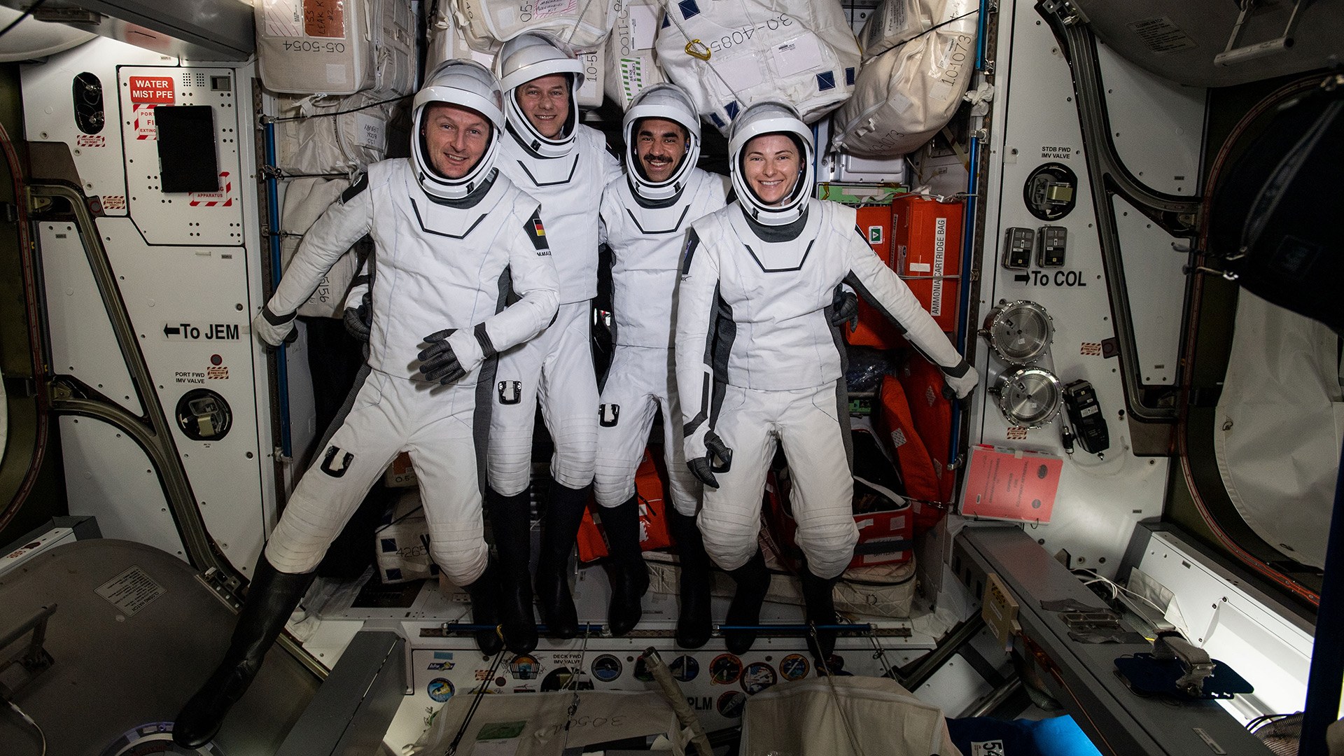ESA astronaut Matthias Maurer and his Crew 3 colleagues in their spacesuits