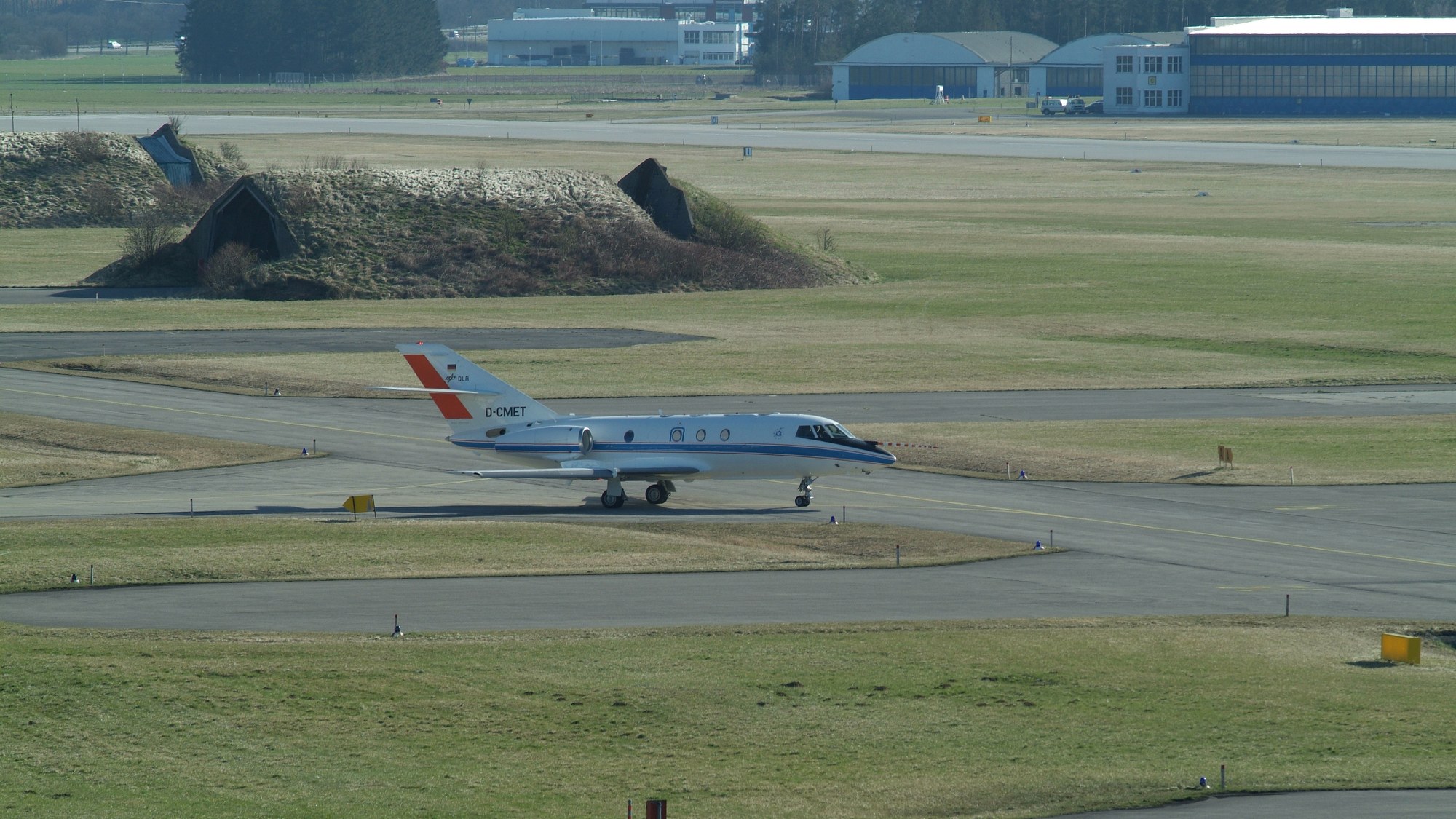 The Falcon 20E makes its way to the runway