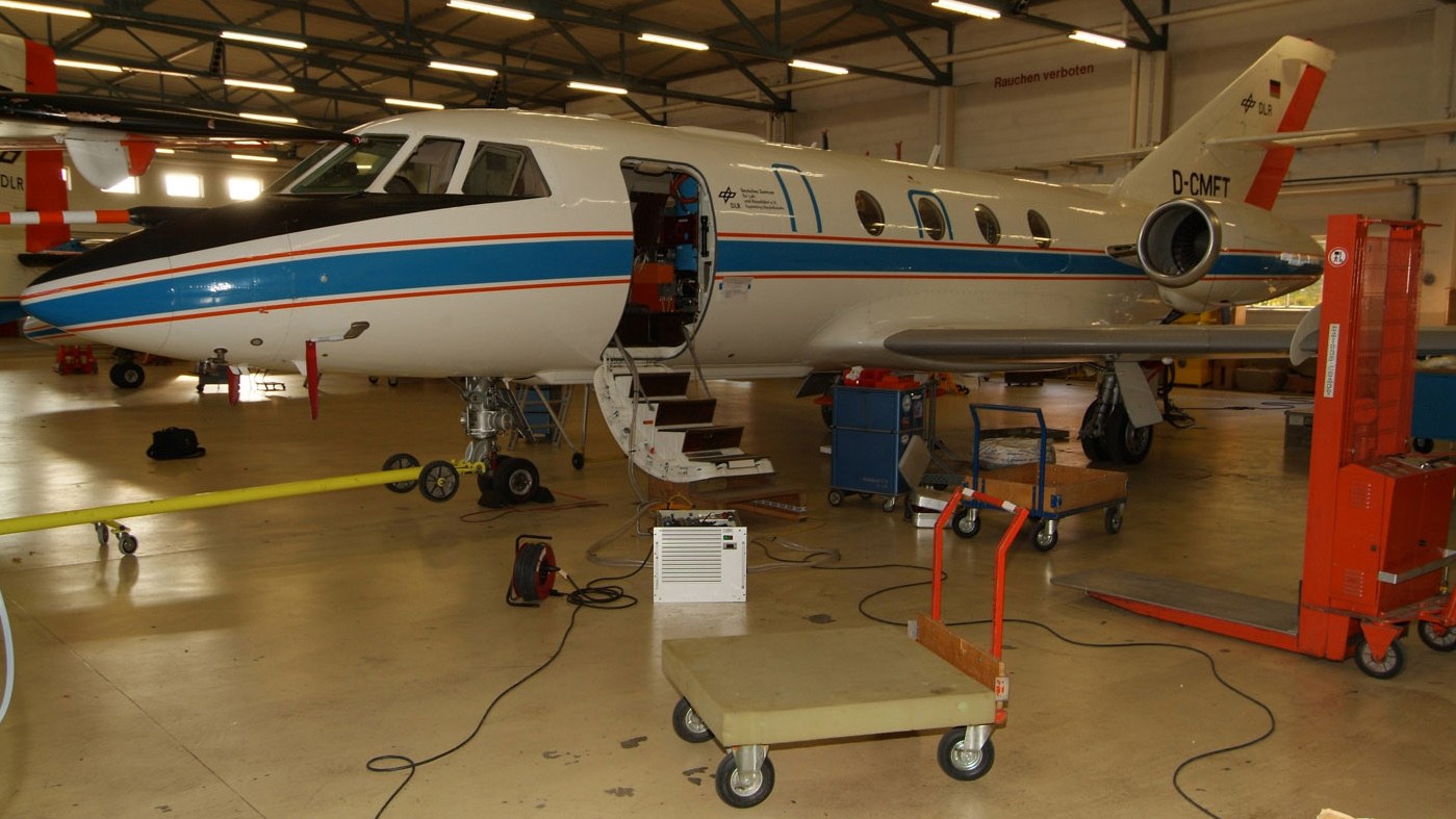 Mission preparations in the maintenance hangar