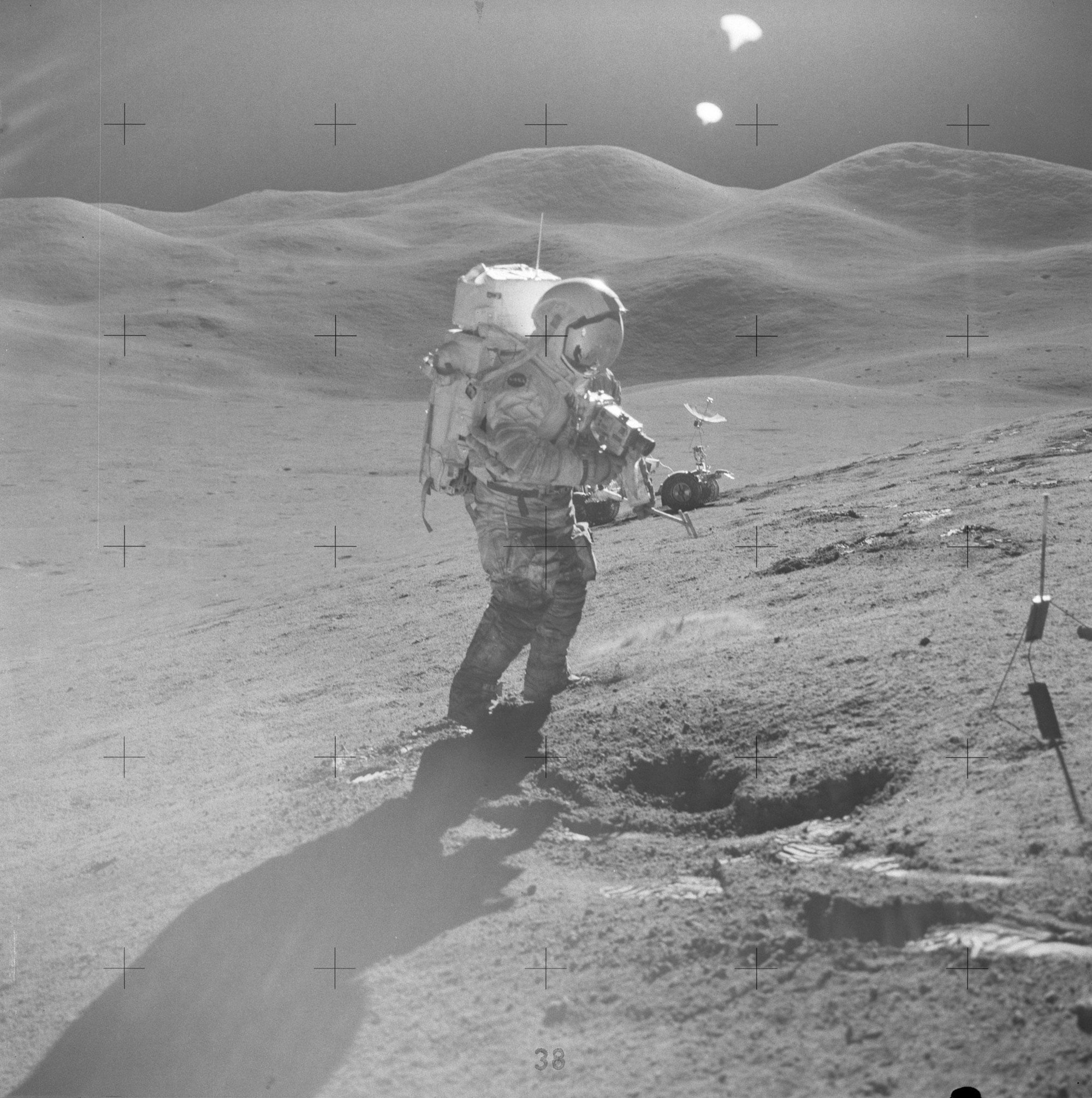 David Scott stands on the slope of Hadley Delta