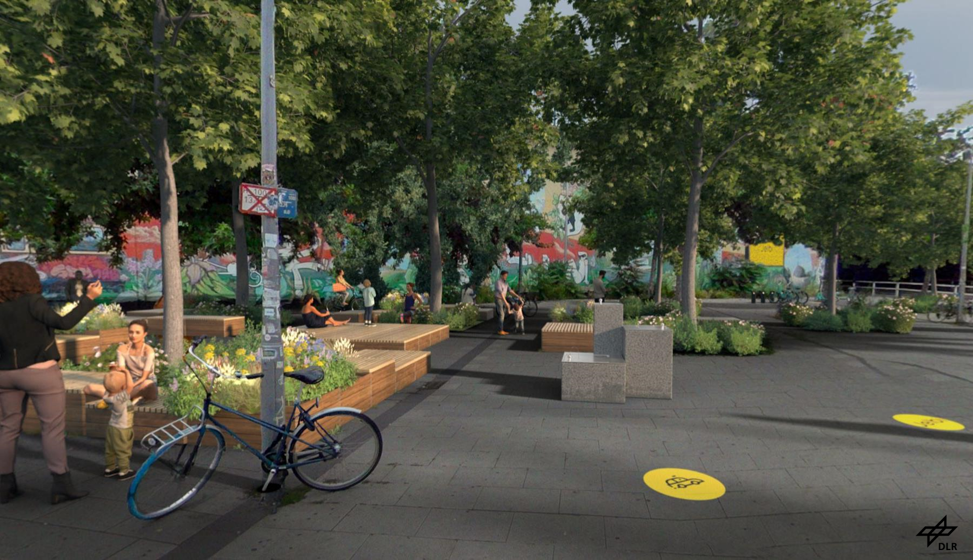 3D embellishment options have been added to the forecourt of a railway station in Berlin-Lichtenberg. These are round floor markings as signposts and wooden benches around plant beds.