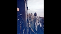 Der Starttag. Die Crew auf einer Plattform an der Spitze der Startrampe. Von hier geht es zum Einstieg in das Raumschiff. Bild: NASA (KSC%2d69PC%2d399)